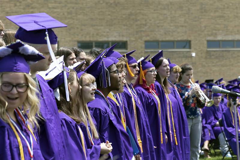 The Dixon High School choir sings “Don’t Lose Sight” Sunday, May 25, 2025, during graduation.