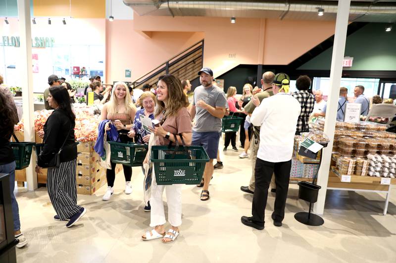 Shoppers waited in line for hours on Wednesday, June 25, 2025 to enter the new Whole Foods Market in St. Charles.