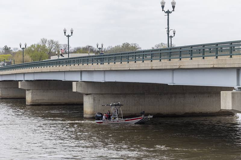 Search squads check the Rock River in Dixon Tuesday, April 14, 2026, after an individual jumped over the railing off of the Peoria Avenue Bridge late Monday night.