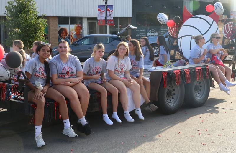 The Hall High School volleyball team rides during the Homecoming parade on Thursday, Sept. 18, 2025 downtown Spring Valley.