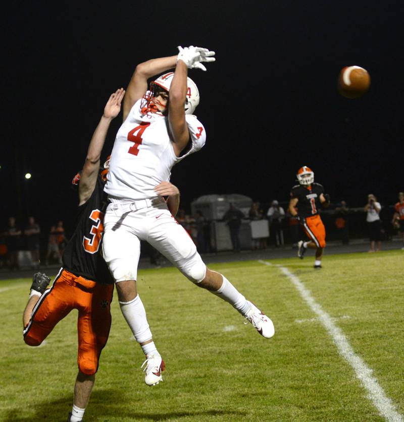 Oregon's Jackobi Donagen jumps for a pass against Byron on Friday, Sept. 12, 2025 at Everett Stine Stadium in Byron.