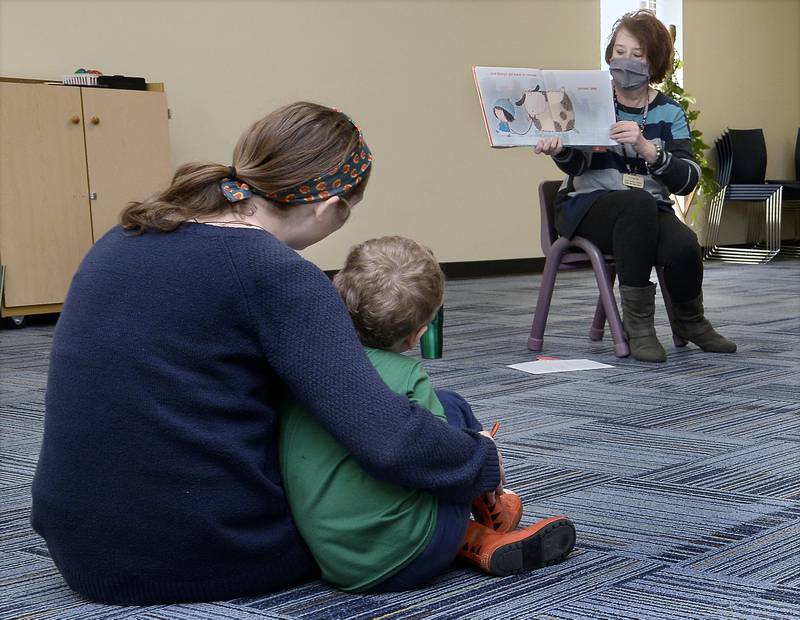 Youth Services Librarian Annette Kohn reads one of many books Tuesday, April 5, 2022, during a children's story hour at the Reddick Library in Ottawa. The children's story hour is one of the weekly events at the library.