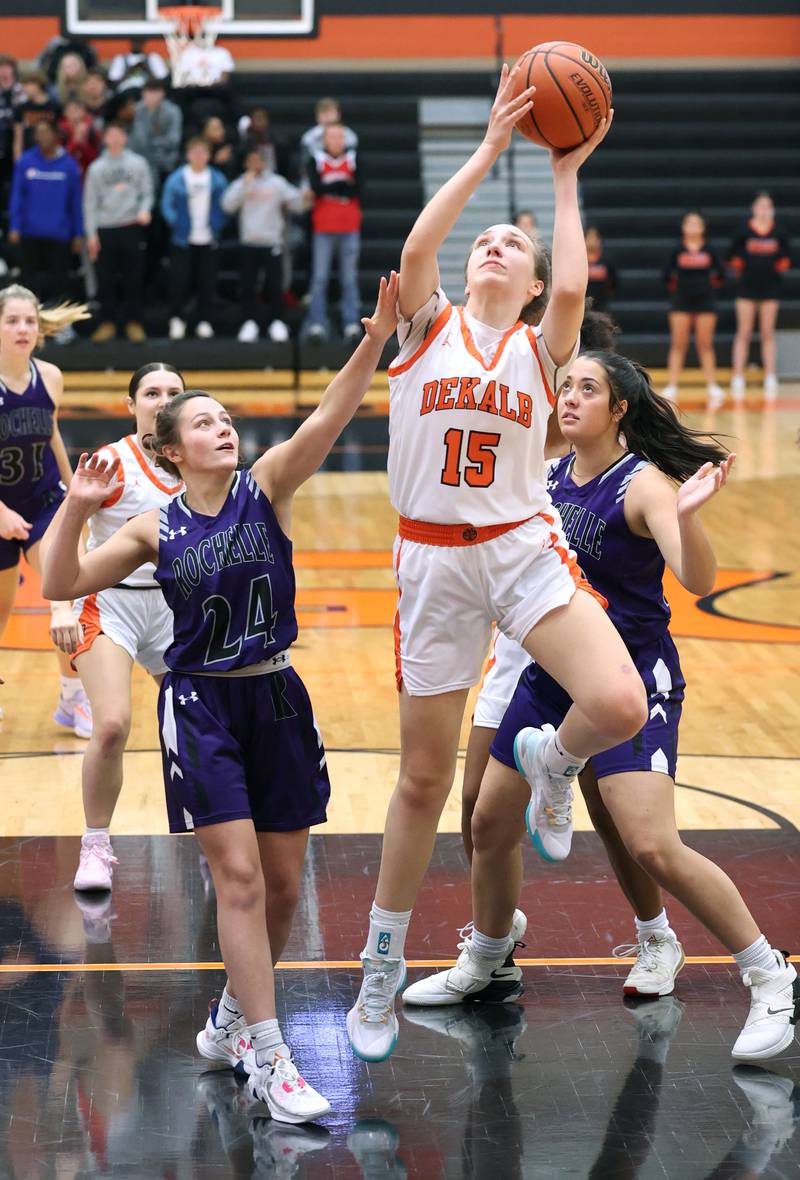 DeKalb's Kailey Porter scores over Rochelle's Sydney Tabor during their game Monday, Nov. 28, 2022, at DeKalb High School.
