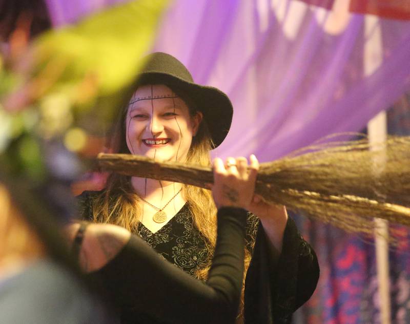 Jaime Thompson, dances during The Village Witches performance on Wednesday, April 30. 2025 at Crafty Eclectic in La Salle. The witches performed five dances as a part of a world wide witches dance to honor the original Wolfshager Hexenbrut, a meaning "The Wolf Hunter's Coven," a group of women from Germany known for the choreographed with dance. The witches also dedicated their performance to their friend RJ who passed away recently.