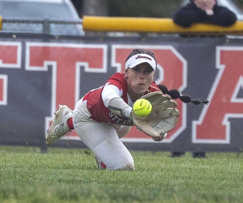Fulton’s Zoe Kunau makes a diving attempt in centerfield against Amboy Wednesday, May 21, 2025, during a Regional semifinal softball game.