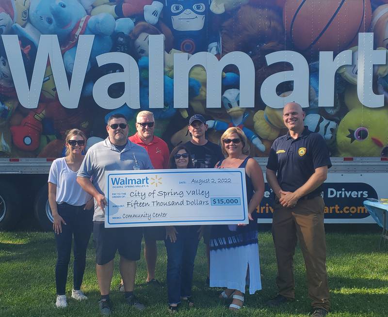 Tuesday night in Spring Valley held the city’s National Night Out celebration with family-friendly activities, bounce houses and, of course, Walmart Distribution presenting a $15,000 donation to the city to help fund its community center project.