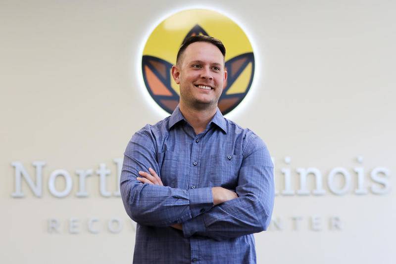 Chris Reed poses for a photo at Northern Illinois Recovery Center on Tuesday in Crystal Lake.  The drug recovery facility is preparing for a grand opening on Wednesday.