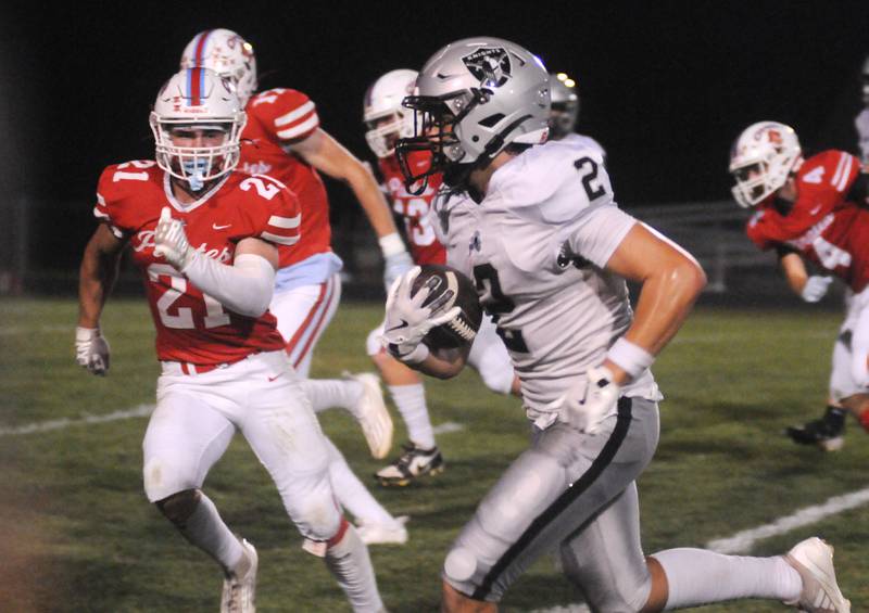 Ottawa's Jace Veith pursues Kaneland's Dylan Sanagustin at King Field on Friday, Sept. 20, 2024.