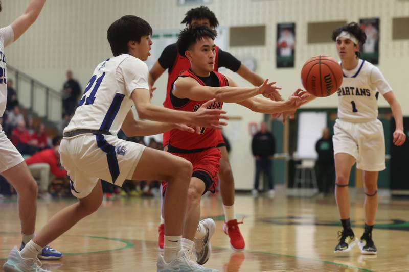 Bolingbrook’s Josh Aniceto passes off the ball against St. Francis in the Jack Tosh 2023 Holiday Classic on Wednesday, Dec.27th, 2023 in York.