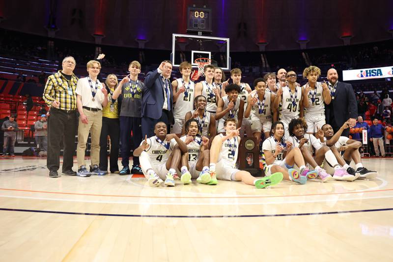 Yorkville Christian pose with the championship trophy after their 54-41 win over Liberty in the Class 1A championship game at State Farm Center in Champaign. Friday, Mar. 11, 2022, in Champaign.