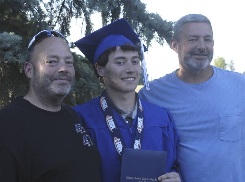 Brad and Dan Matznick pose with new grad Garrett Matznick following the ceremony at Newman. The Newman High School Class of 2026 Commencement Ceremony was held on Wednesday, May 20, 2026, at Newman Central Catholic High School. in Sterling.