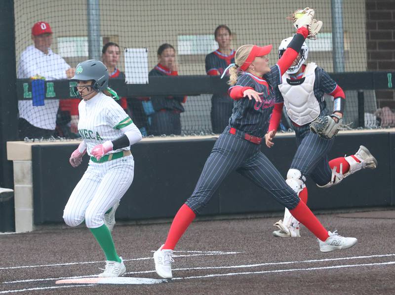 Seneca's Ameliah Weber steps on first base as Ottawa first baseman Joslyn Rose takes her foot off the bag to catch the ball on Friday, May 1, 2026 at Seneca High School.