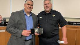 Oswego deputy police chief honored for 27 years of service to village