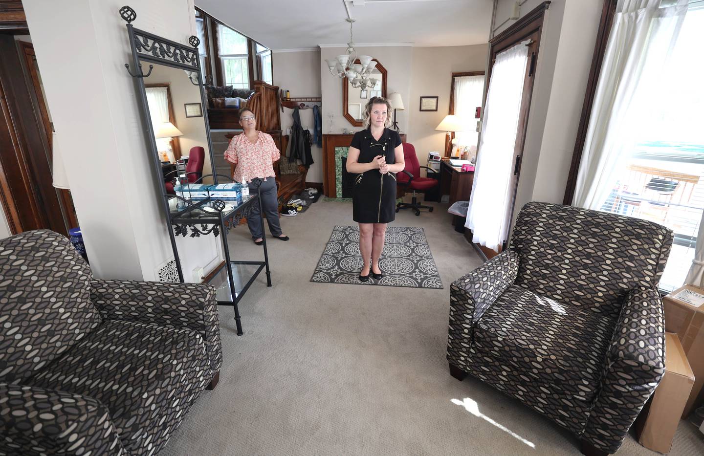 Marissa Kirch, (right) manager of addiction treatment services and Northwestern Medicine Ben Gordon Center Discovery House, along with Juliette Rigdon, recovery home coordinator, give a tour of the facility Tuesday, Sept. 20, 2022, at the facility in DeKalb. Discovery House is a addiction treatment service program for adult women.