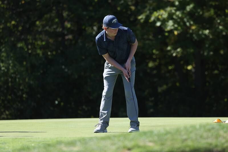 Lemont’s Andrew Barwick putts on the sixth hole in the Class 2A Lemont Boys Golf Sectional on Monday, Oct. 7, 2024 at Wedgewood Golf Course in Lemont.