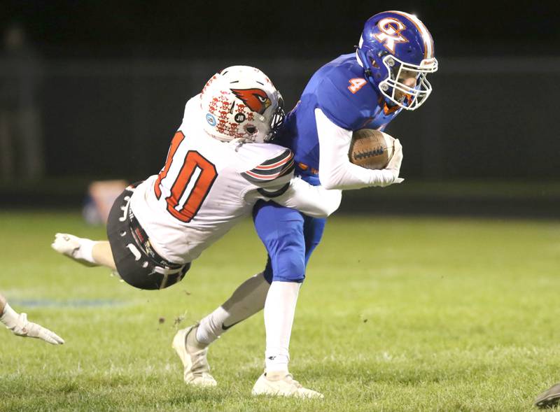 Genoa-Kingston running back Ethan Wilnau carries Stillman Valley's Jack Seacrist for a couple extra yards during their game Friday, Oct. 22, 2021, at Genoa Kingston High School.