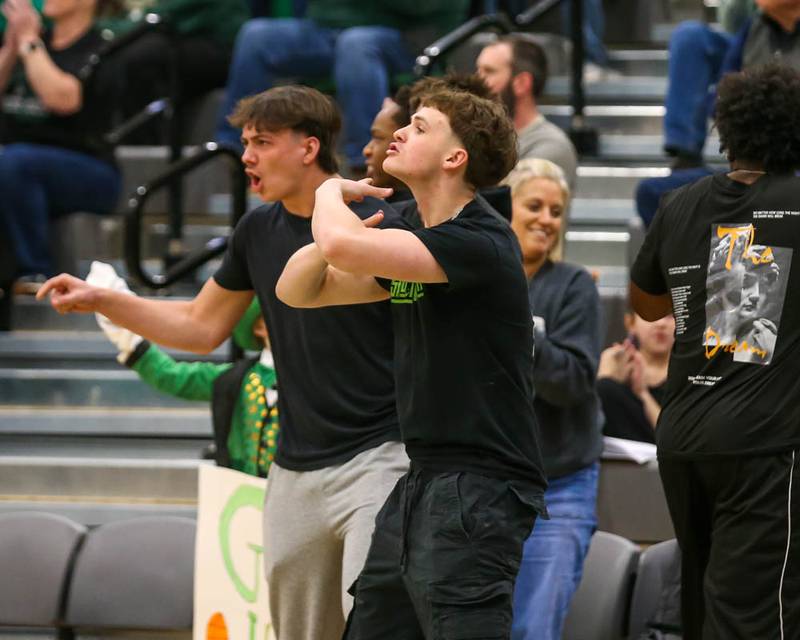 The Bishop Mcnamara student section cheers on the team during their Class 2A Seneca Sectional final basketball game between Bishop McNamara at Yorkville Christian, March 6, 2026 in Senaca.