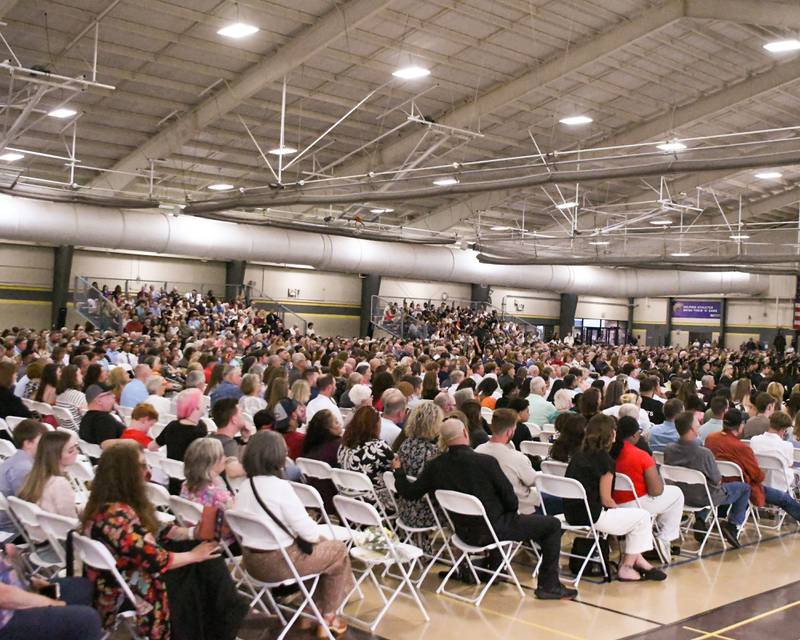 Friends and family fill the fieldhouse at Sycamore High School on Sunday, May 24, 2026, for the Class of 2026 Commencement.