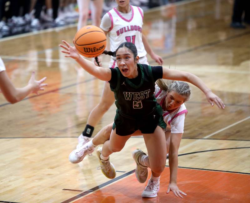 Glenbard West's Lauren Escalante goes after the rebound during the Class 4A St. Charles East Sectional final against Batavia on Thursday, Feb. 27, 2025 in St. Charles.