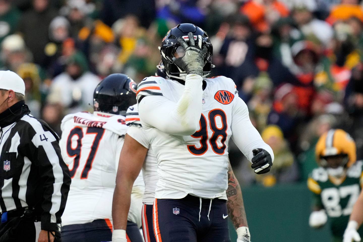 Chicago Bears defensive end Montez Sweat (98) reacts after a sack against the Green Bay Packers during the first half of an NFL football game Sunday, Dec. 7, 2025, in Green Bay, Wis. (AP Photo/Morry Gash)