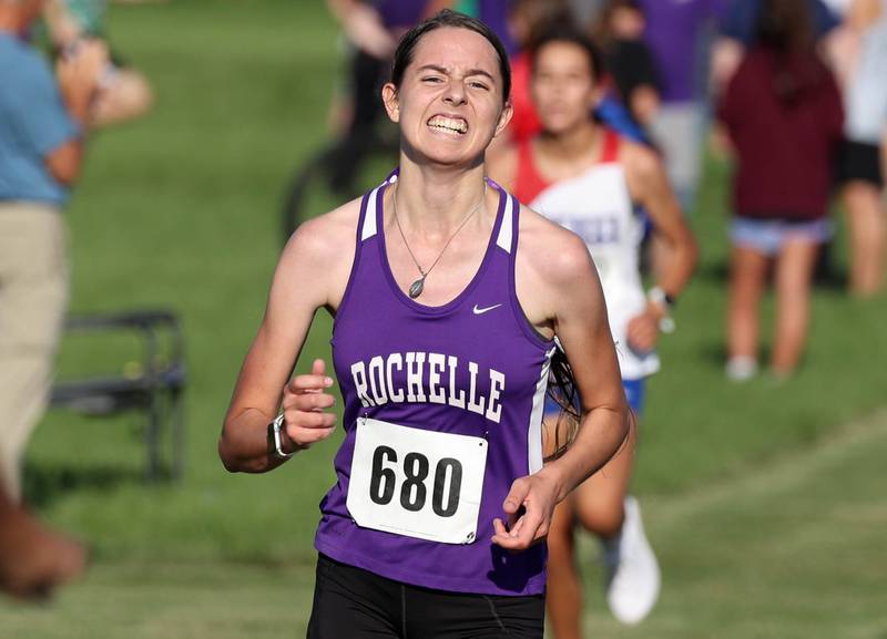 Rochelle’s Annaliese Koziol finishes the girls varsity race Tuesday, Sept. 2, 2025, during the Sycamore Cross Country Invitational at Northern Illinois University in DeKalb.