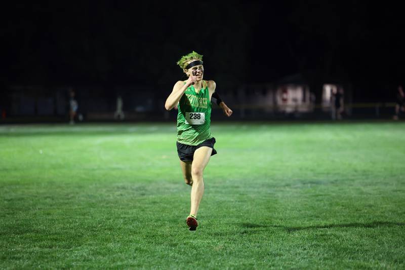 Bishop McNamara's Justice Provost nears the finish line during the All-City cross country meet at Bishop McNamara on Wednesday, Sept. 17, 2025.