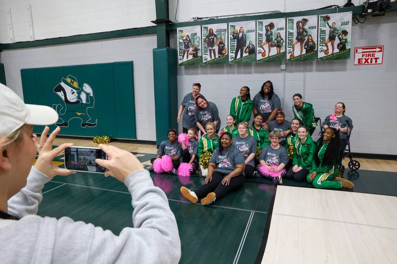 River Valley Special Rec cheerleaders pose for a photo with the Bishop McNamara cheer squad during the RVSRA game against Lincolnway Special Recreation Association at Bishop McNamara on Friday, Jan. 30, 2026.