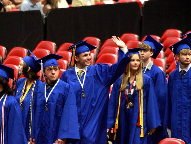 Geneva High School graduates enter for the school’s commencement ceremony on Tuesday, June 3, 2025 at Northern Illinois University in DeKalb.