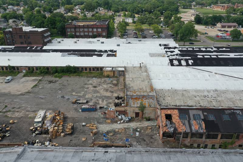 An aerial view of the storage area behind the historic Westclox building on Monday, July 17, 2023 in Peru. The building caught fire last Friday when an unattended fire behind the the building  was the cause of the larger fire in the building.