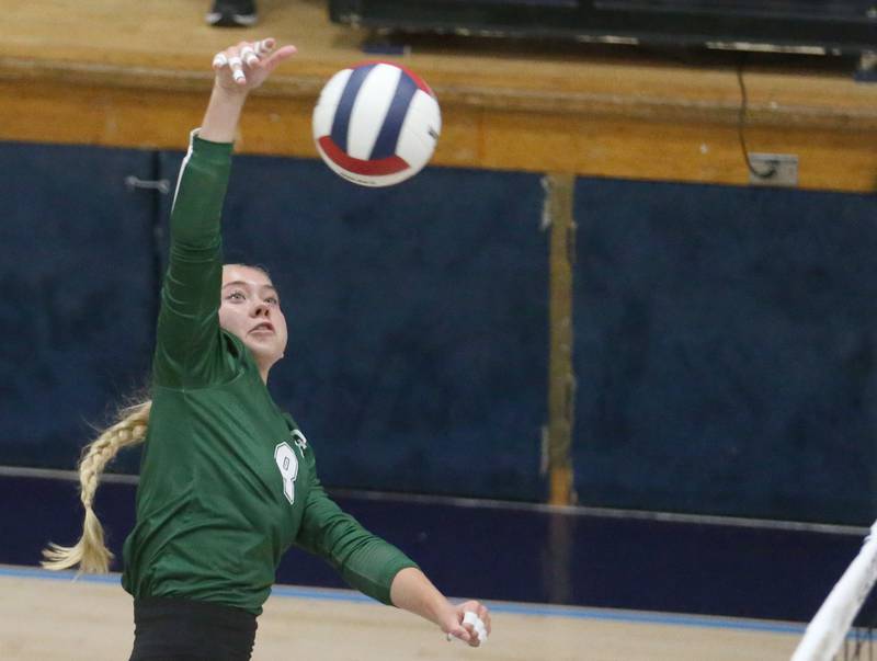 St. Bede's Nellie Potthoff spikes the ball past Marquette on Thursday, Sept. 4, 2025 at Bader Gym.