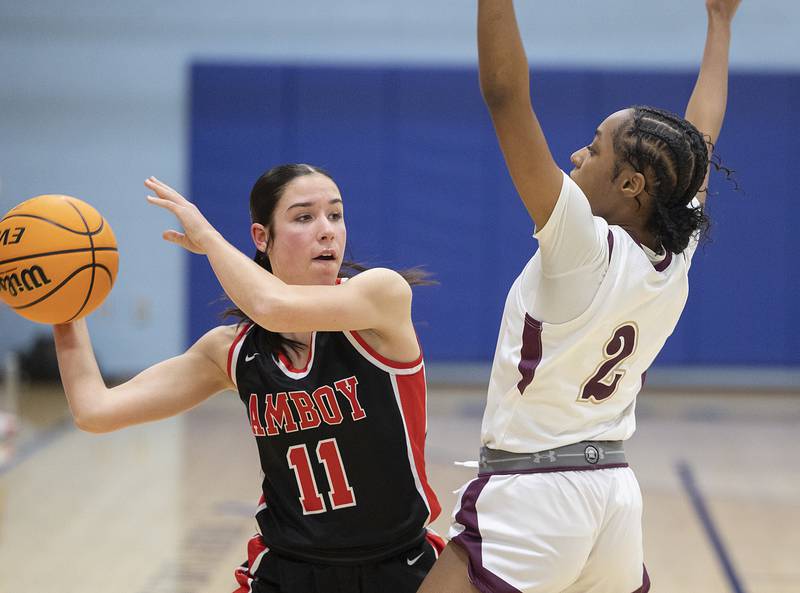 Amboy’s Tyrah Vaessen looks to pass against Morgan Park Academy’s Anna Shepard Tuesday, Feb. 25, 2025, in the Class 1A Sectional semifinal at Hinckley-Big Rock.