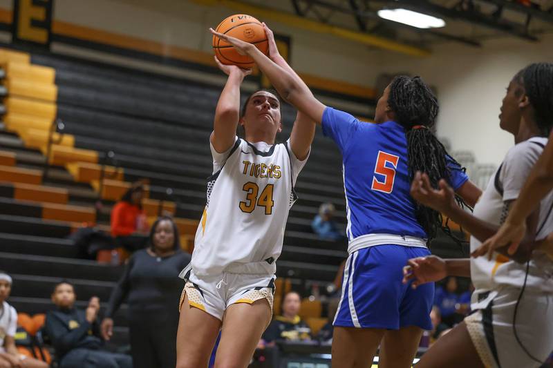 Joliet West’s Natalie Clemente puts up a shot against Butler College Prep on Tuesday, Dec. 16, 2025 in Joliet.