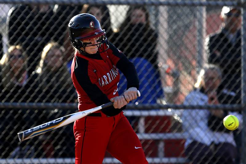 Barrington’s Ainsley Muno hits a home run during a non-conference softball game Friday, April 1, 2022, between McHenry and Barrington at Barrington High School.