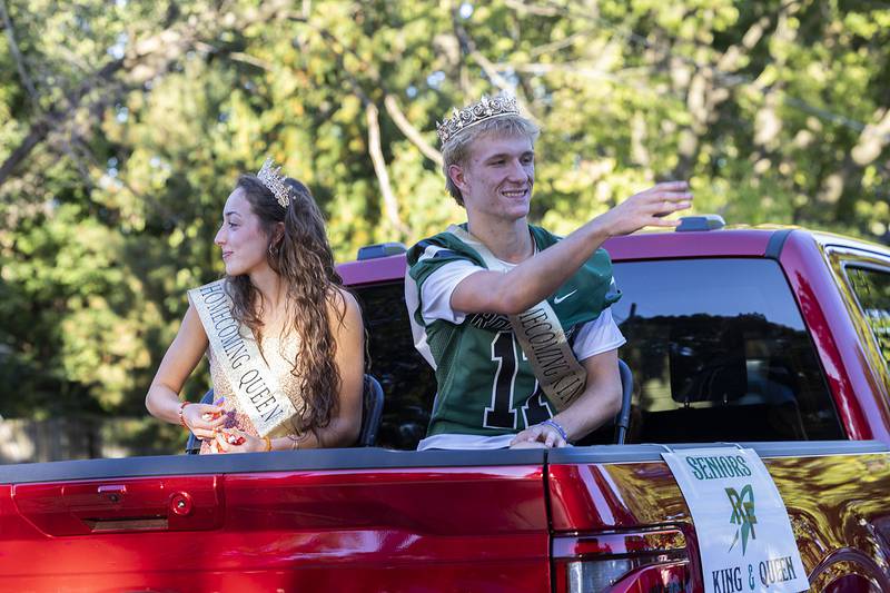 Rock Falls homecoming Queen and King, Maya Kobbeman and Logan Thome, throw candy Thursday, Sept. 25, 2025, during the homecoming parade.