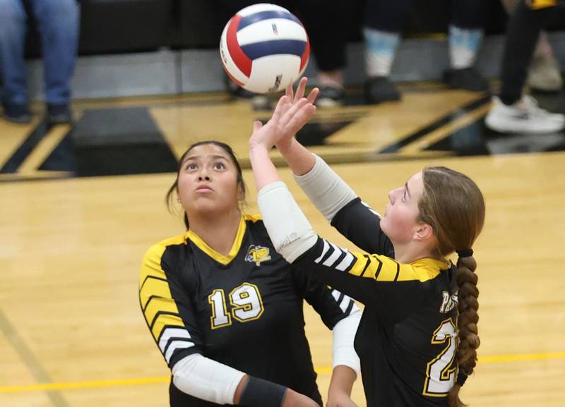 Putnam County's Kennedy Holocker pushes the ball to the Orion side as teammate Britney Trinidad watches during the Class 1A Regional final on Thursday, Oct. 30, 2025 at Putnam County High School.