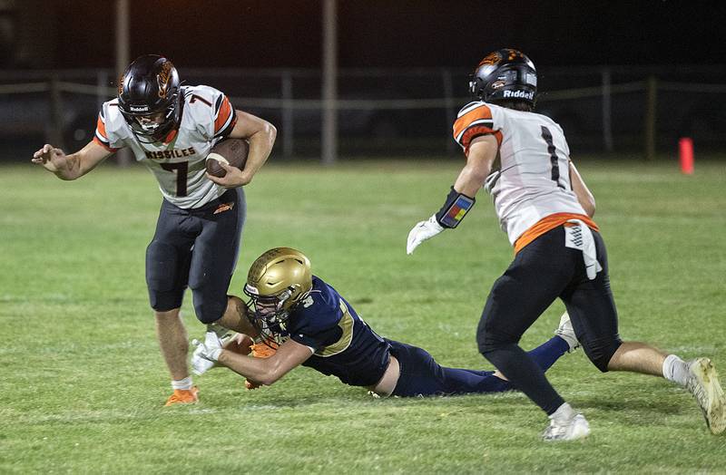 Milledgeville’s Konner Johnson is tackled by Polo’s Damon Rowe Friday, Sept. 19, 2025.