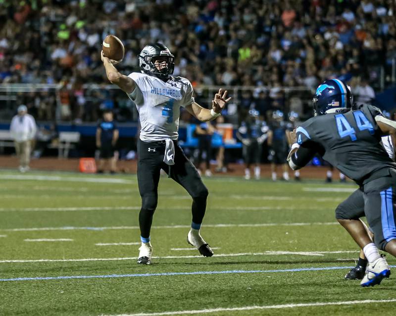 Willowbrook's Joey Tumilty (4) passes during varsity football game between Willowbrook at Downers Grove South.  Sept 16, 2022