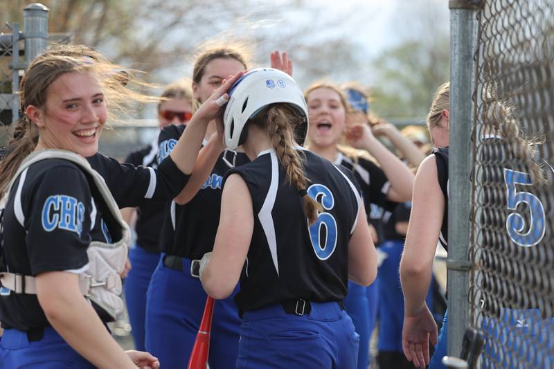 Central's Lia Prairie is congratulated by teammates after hitting an inside-the-park homerun during the Comets' 9-2 victory over Gardner-South Wilmington on Tuesday, April 22. The win keeps Central's perfect River Valley Conference record intact.