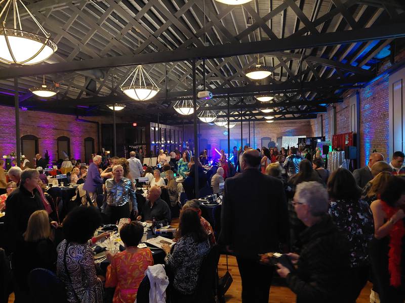 Guests mingle during dinner Saturday, Nov. 4, 2023, of the Starved Rock Country Community Foundation's Disco Ball.