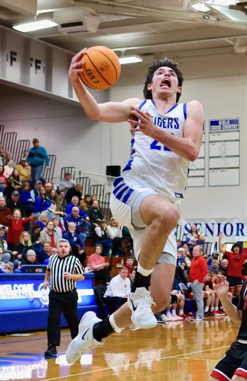 Princeton senior Noah LaPorte soars to the basket in the first half during Friday's Senior Night game against Hall. The Tigers won 51-29.