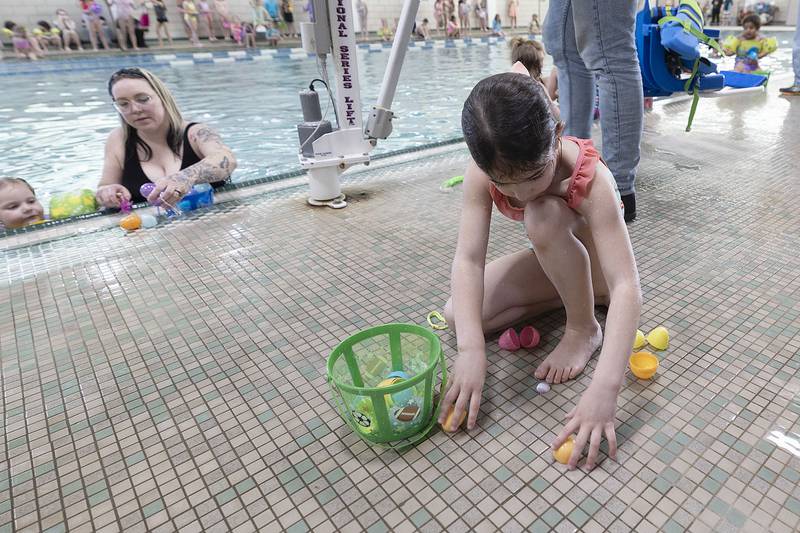 Bostyn Parvin, 4, counts her eggs Friday, April 11, 2025, at the Sterling-Rock Falls YMCA Easter Egg Hunt.