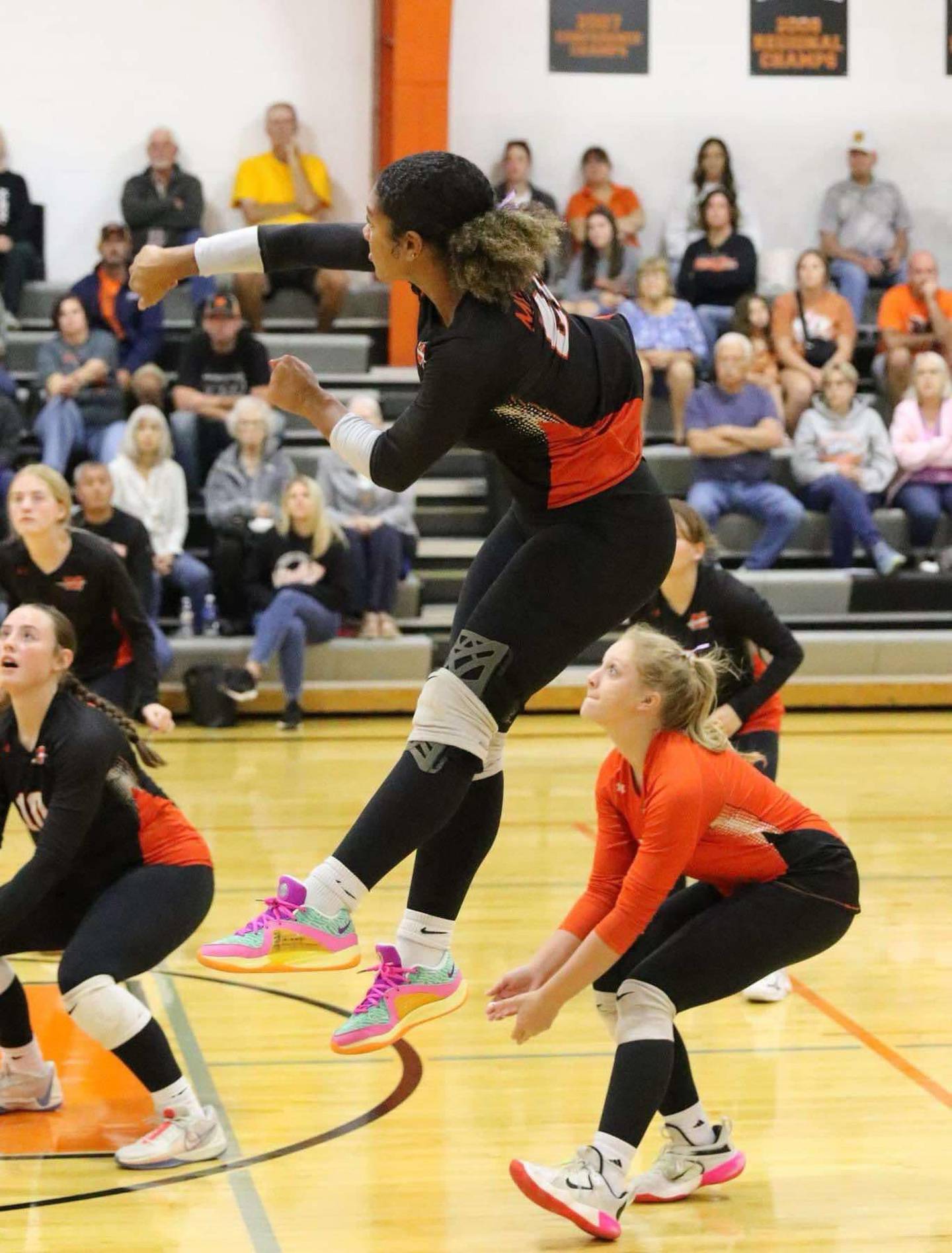 Milledgeville junior volleyball player Kendra Kingsby goes up for a hit.