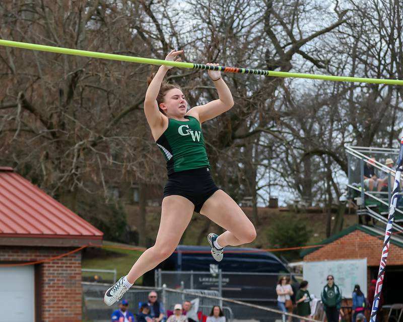 Glenbard West's Nina Wintermute competes in the pole vault at the Glenbard West's Sue Pariseau Girls Track and Field Invitational.  April 23.2022.