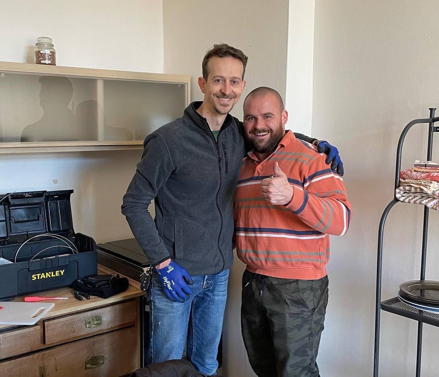 Former St. Charles resident Matthew Titus (left) is now a missionary in Prague for Chapelstreet Church in Geneva.  He and volunteers set up apartments for Ukrainian refugees fleeing the fighting.