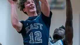 Boys Basketball: Ryan Johnson showcases growing game, gets double-double to power Oswego East past Downers Grove South