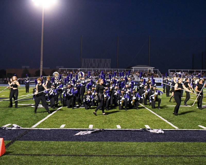 Downers Grove North marching band performs during the Downers Grove South Marching Mustangs Music Bowl on Saturday Oct. 5, 2024, held at Downers Grove South.