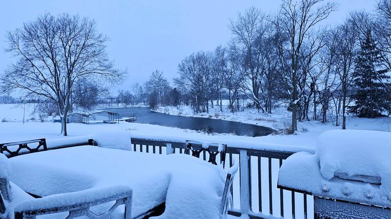 Snow blankets a backyard northwest of Princeton, Illinois on Friday, January 12, 2024