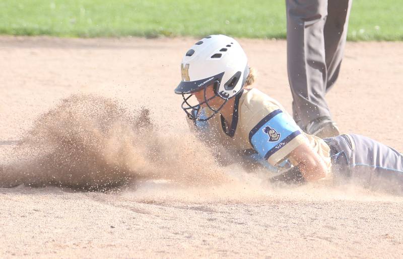 Marquette's Avery Durdan slides safely after stealing second base on Tuesday, April 29, 2025 in Ottawa.