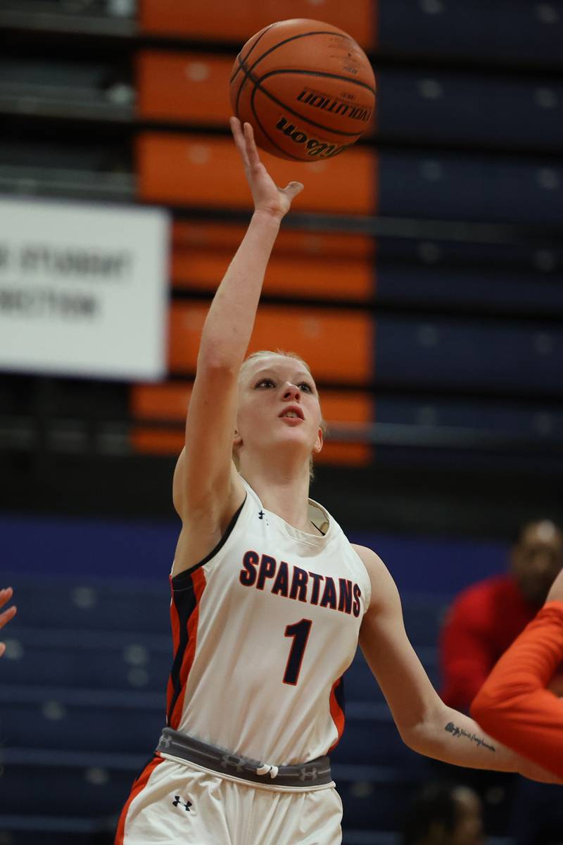 Romeoville’s Emily Gabrelcik puts up a shot against Minooka on Tuesday January 24th, 2023.