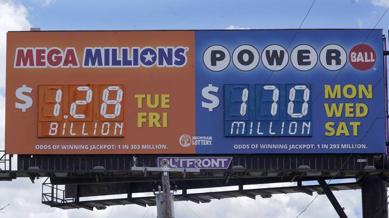 A sign displays the Mega Millions lottery jackpot in Detroit, Friday, July 29, 2022. The Mega Millions lottery jackpot keeps getting larger as officials raised the massive prize to $1.28 billion on Friday, just hours before the next drawing.(AP Photo/Paul Sancya)